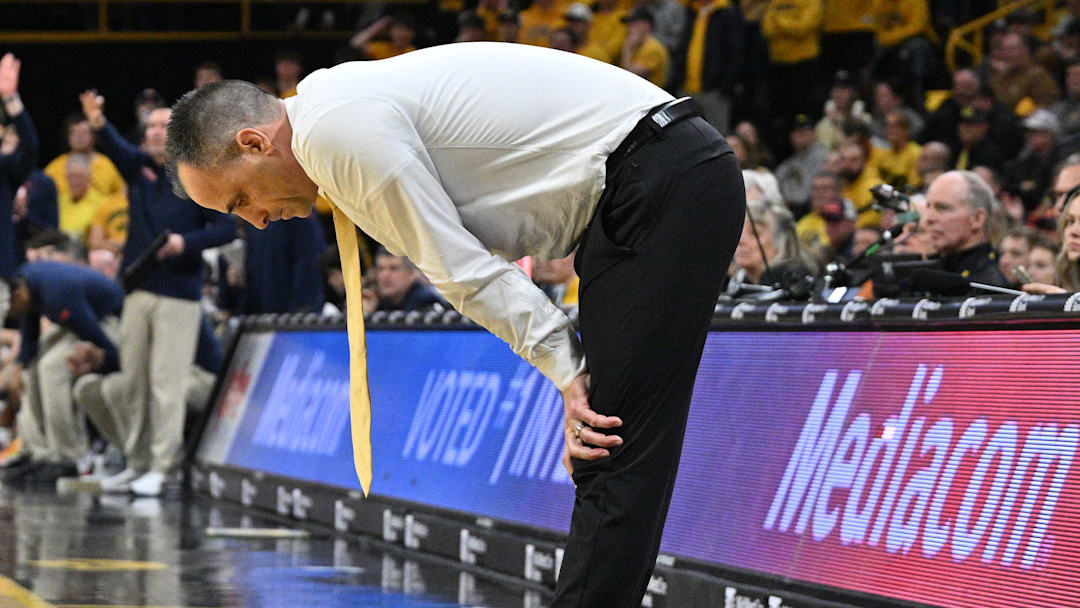 Iowa Hawkeyes head coach Ben McCollum