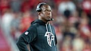 Atlanta Falcons head coach Raheem Morris needs to find a way to get a road win against the New England Patriots to cool his seat.