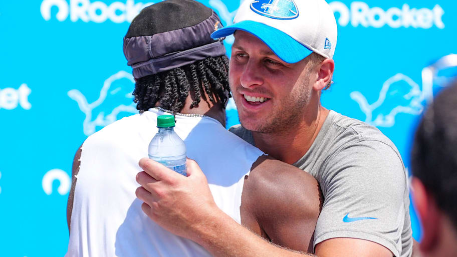 Detroit Lions quarterback Jared Goff hugs Miami Dolphins safety Ifeatu Melifonwu (9) after joint practice  | Kimberly P. Mitchell / USA TODAY NETWORK via Imagn Images