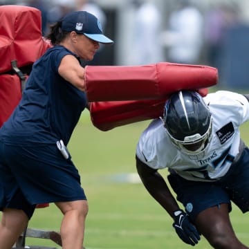 Lori Locust, Tennessee Titans defensive quality control assistant, runs players through drills with the coaching staff during mandatory mini-camp at Ascension Saint Thomas Sports Park in Nashville, Tenn., Tuesday, June 4, 2024. Locust is the first-ever woman coach for the Nashville football team.