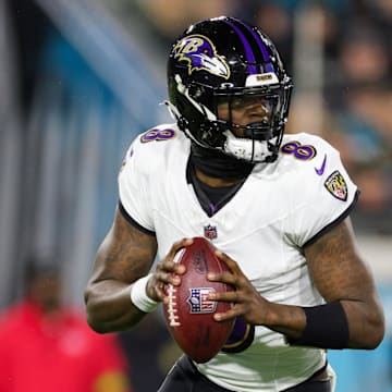 Dec 17, 2023; Jacksonville, Florida, USA;  Baltimore Ravens quarterback Lamar Jackson (8) drops back to pass against the Jacksonville Jaguars in the first quarter at EverBank Stadium. Mandatory Credit: Nathan Ray Seebeck-Imagn Images