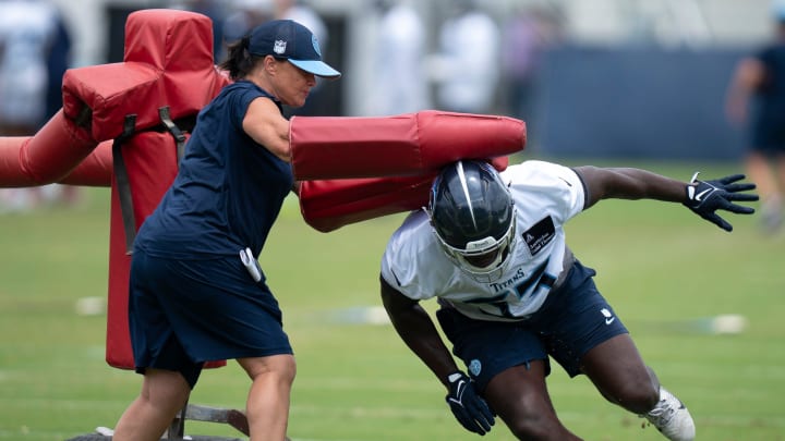 Lori Locust, Tennessee Titans defensive quality control assistant, runs players through drills with the coaching staff during mandatory mini-camp at Ascension Saint Thomas Sports Park in Nashville, Tenn., Tuesday, June 4, 2024. Locust is the first-ever woman coach for the Nashville football team.