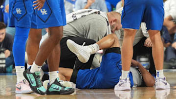 Kentucky’s Jaland Lowe is injured as the Blue and White team scrimmaged each other in Memorial Coliseum Friday night.
Oct. 17, 2025