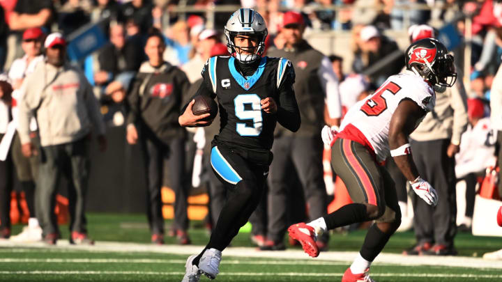 Jan 7, 2024; Charlotte, North Carolina, USA;  Carolina Panthers quarterback Bryce Young (9) scrambles in the fourth quarter at Bank of America Stadium. Mandatory Credit: Bob Donnan-USA TODAY Sports