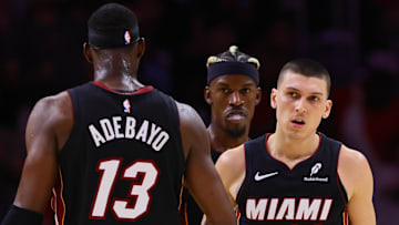 Nov 4, 2024; Miami, Florida, USA; Miami Heat guard Tyler Herro (14) celebrates with Miami Heat center Bam Adebayo (13) after scoring against the Sacramento Kings during the fourth quarter at Kaseya Center. Mandatory Credit: Sam Navarro-Imagn Images