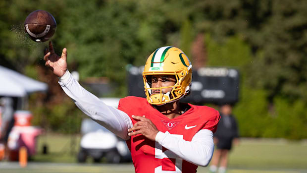 Oregon quarterback Dante Moore throws out a pass during practice with the Oregon Ducks Wednesday, Aug. 28, 2024 at the Hatfie