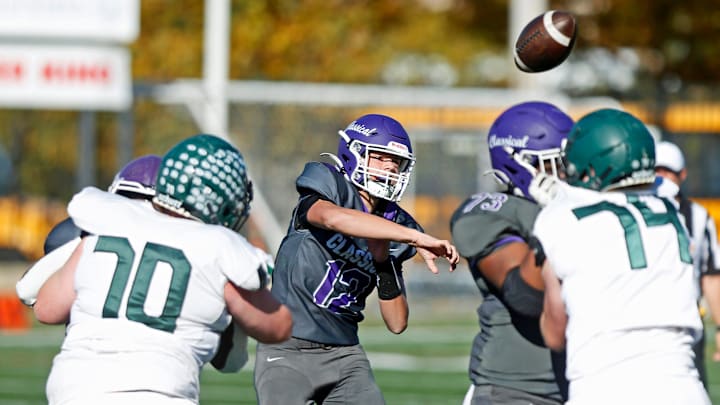 Quarterback Parker Howley throws a pass for the Classical Purple varsity football squad last season. Quarterback Parker Howley throws a pass for the Classical Purple varsity football squad last season.