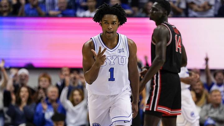 Feb 7, 2026; Provo, Utah, USA; BYU Cougars guard Robert Wright III (1) reacts to a made three-point basket during the second half against the Houston Cougars at Marriott Center. Mandatory Credit: Aaron Baker-Imagn Images