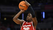 Mar 16, 2025; Indianapolis, IN, USA; Wisconsin Badgers guard John Blackwell (25) shoots a three point basket during the first half against the Michigan Wolverines during the 2025 Big Ten Championship Game at Gainbridge Fieldhouse. Mandatory Credit: Robert Goddin-Imagn Images
