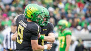 Oregon quarterback Dillon Gabriel congratulates Luke Moga after a touchdown by Mona during the Oregon Ducks’ Spring Game Saturday, April 27. 2024 at Autzen Stadium in Eugene, Ore.