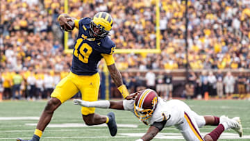 Michigan quarterback Bryce Underwood (19) runs against Central Michigan Central Michigan linebacker Dakota Cochran (1) during the first half at Michigan Stadium in Ann Arbor on Saturday, Sept. 13, 2025.