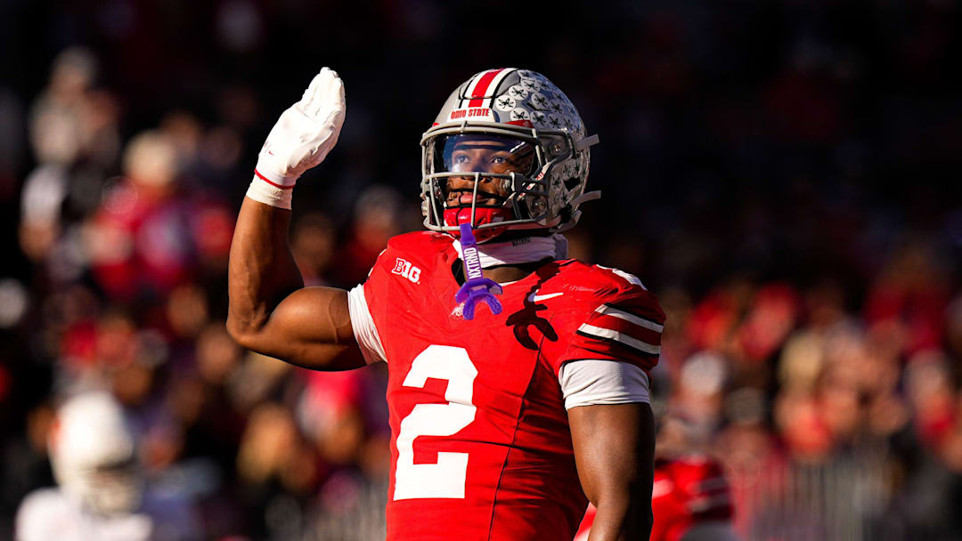 Ohio State Buckeyes defensive back Caleb Downs (2) celebrates after sacking Rutgers Scarlet Knights quarterback Athan Kaliakmanis (16) in the second half of the NCAA football game at Ohio Stadium on Saturday, Nov. 22, 2025 in Columbus, Ohio. Ohio State Buckeyes defensive back Caleb Downs (2) celebrates after sacking Rutgers Scarlet Knights quarterback Athan Kaliakmanis (16) in the second half of the NCAA football game at Ohio Stadium on Saturday, Nov. 22, 2025 in Columbus, Ohio.