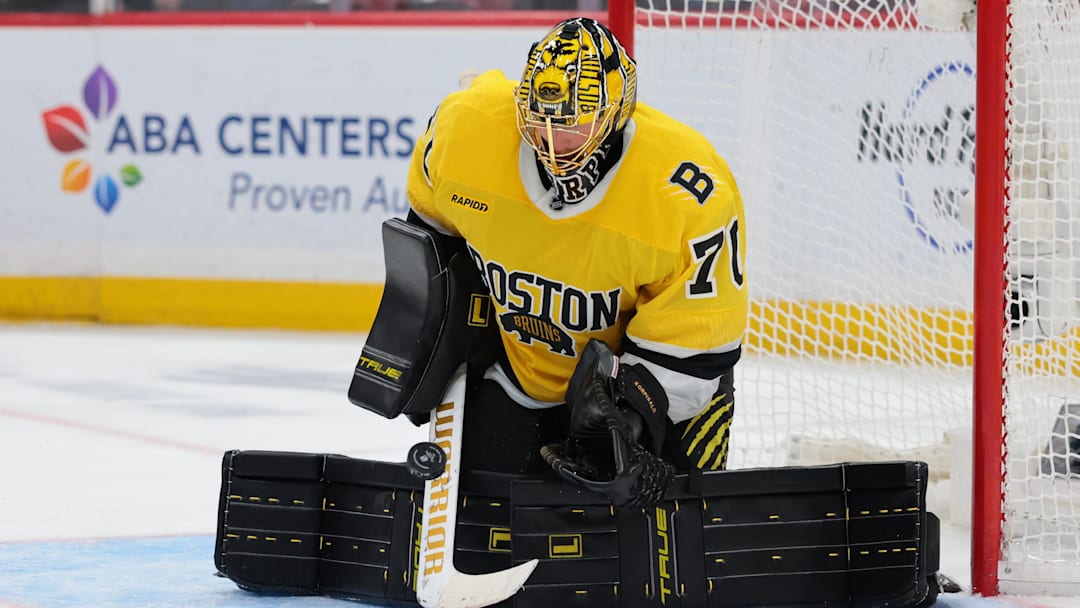 Feb 4, 2026; Sunrise, Florida, USA; Boston Bruins goaltender Joonas Korpisalo (70) makes a save against the Florida Panthers during the third period at Amerant Bank Arena. Mandatory Credit: Sam Navarro-Imagn Images
