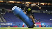 Feb 27, 2025; Indianapolis, IN, USA; Texas A&M defensive lineman Nic Scourton (DL65) participates in drills during the 2025 NFL Combine at Lucas Oil Stadium.