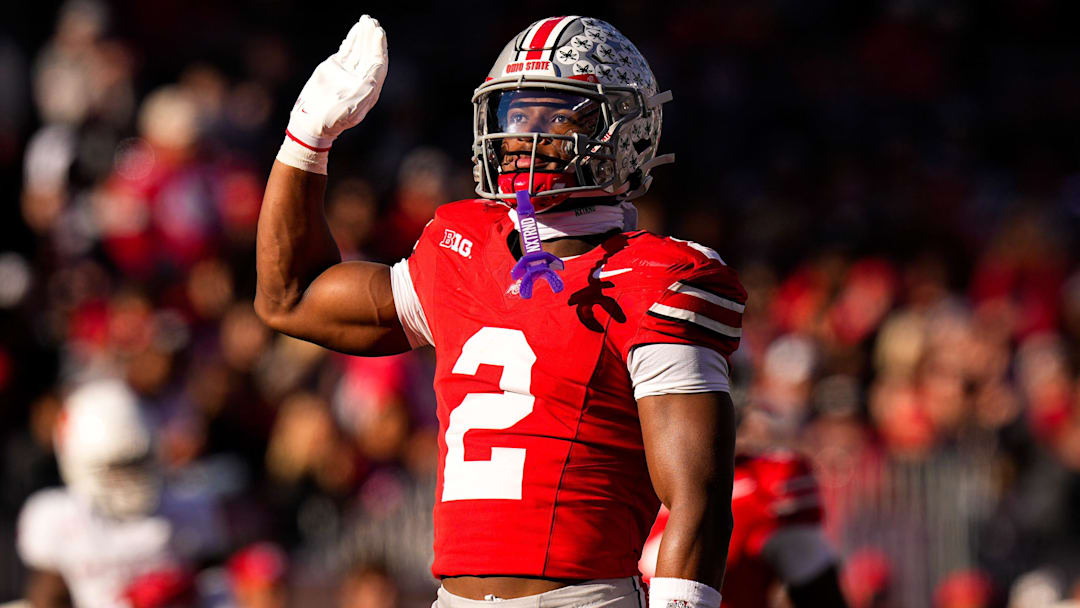 Ohio State Buckeyes defensive back Caleb Downs (2) celebrates after sacking Rutgers Scarlet Knights quarterback Athan Kaliakmanis (16) in the second half of the NCAA football game at Ohio Stadium on Saturday, Nov. 22, 2025 in Columbus, Ohio.