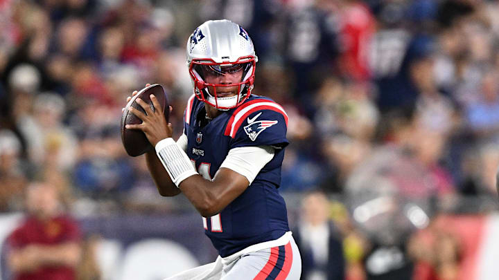 Aug 8, 2025; Foxborough, Massachusetts, USA; New England Patriots quarterback Joshua Dobbs (11) looks to pass against the Washington Commanders during the first half at Gillette Stadium. Mandatory Credit: Brian Fluharty-Imagn Images