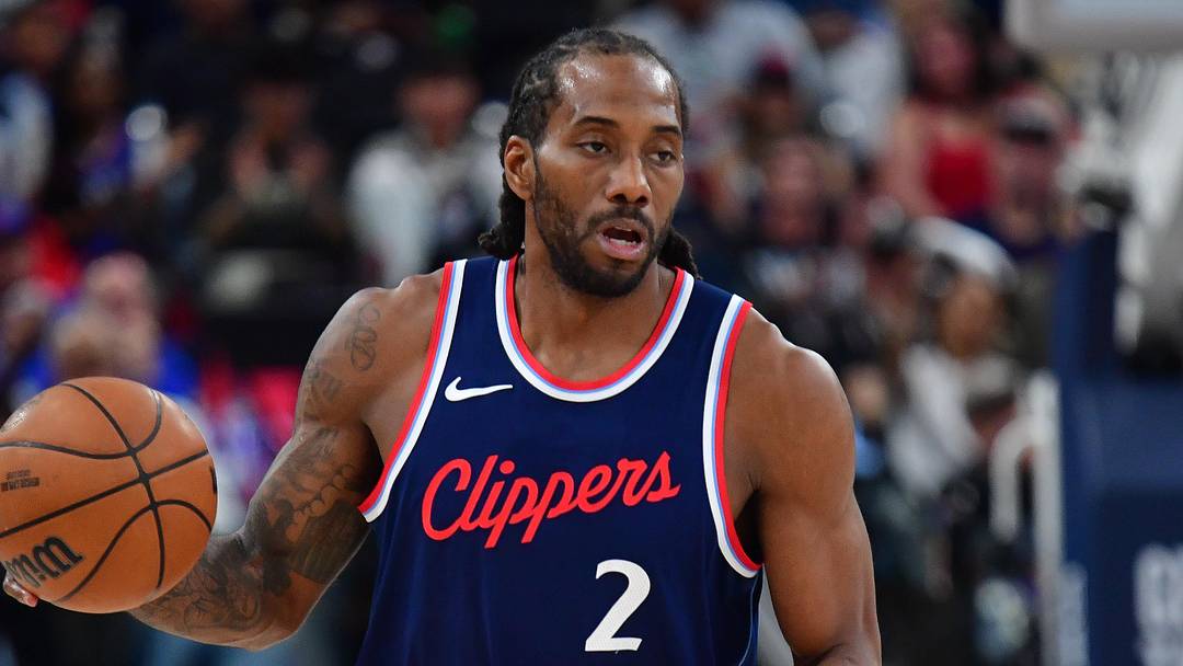 Apr 24, 2025; Inglewood, California, USA; Los Angeles Clippers forward Kawhi Leonard (2) moves the ball up court against the Denver Nuggets during the second half of game three in the first round for the 2024 NBA Playoffs at Intuit Dome. Mandatory Credit: Gary A. Vasquez-Imagn Images Apr 24, 2025; Inglewood, California, USA; Los Angeles Clippers forward Kawhi Leonard (2) moves the ball up court against the Denver Nuggets during the second half of game three in the first round for the 2024 NBA Playoffs at Intuit Dome. Mandatory Credit: Gary A. Vasquez-Imagn Images