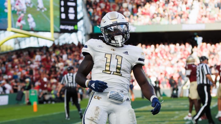 Aug 24, 2024; Dublin, IRL; Georgia Tech running back Jamal Haynes celebrates a touch down against Florida State 
 at Aviva Stadium. Mandatory Credit: Tom Maher/INPHO via USA TODAY Sports