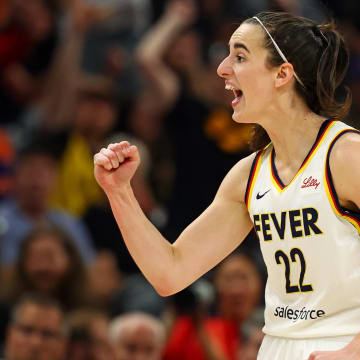 Indiana Fever guard Caitlin Clark (22) reacts to a play