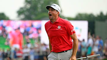 Keegan Bradley celebrates after dropping a putt to win the 2025 Travelers Championship at TPC River Highlands