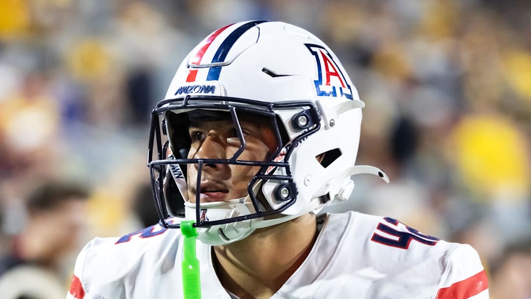 Nov 28, 2025; Tempe, Arizona, USA; Arizona Wildcats defensive lineman Dominic Lolesio (42) against the Arizona State Sun Devils during the 99th Territorial Cup at Mountain America Stadium. Mandatory Credit: Mark J. Rebilas-Imagn Images