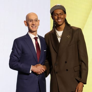 Jun 26, 2024; Brooklyn, NY, USA; Cody Williams poses for photos with NBA commissioner Adam Silver after being selected in the first round by the Utah Jazz in the 2024 NBA Draft at Barclays Center. Mandatory Credit: Brad Penner-USA TODAY Sports