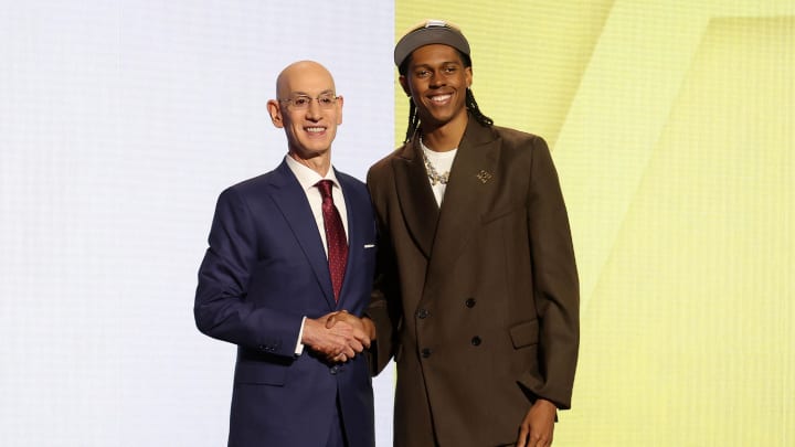 Jun 26, 2024; Brooklyn, NY, USA; Cody Williams poses for photos with NBA commissioner Adam Silver after being selected in the first round by the Utah Jazz in the 2024 NBA Draft at Barclays Center. Mandatory Credit: Brad Penner-USA TODAY Sports