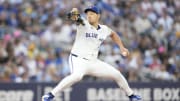 Toronto Blue Jays starting pitcher Yusei Kikuchi (16) pitches to the Texas Rangers during the third inning at Rogers Centre.