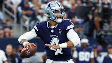 Oct 13, 2024; Arlington, Texas, USA;  Dallas Cowboys quarterback Dak Prescott (4) throws during the first quarter against the Detroit Lions at AT&T Stadium. Mandatory Credit: Kevin Jairaj-Imagn Images
