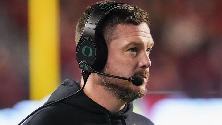 Nov 16, 2024; Madison, Wisconsin, USA;  Oregon Ducks head coach Dan Lanning looks on during the first quarter against the Wisconsin Badgers at Camp Randall Stadium. Mandatory Credit: Jeff Hanisch-Imagn Images
