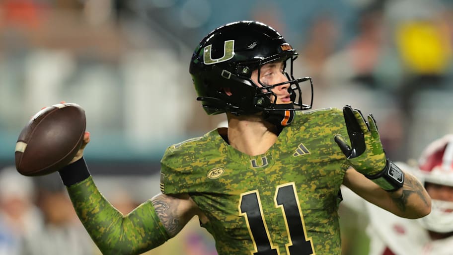 Carson Beck throws the ball against Stanford.