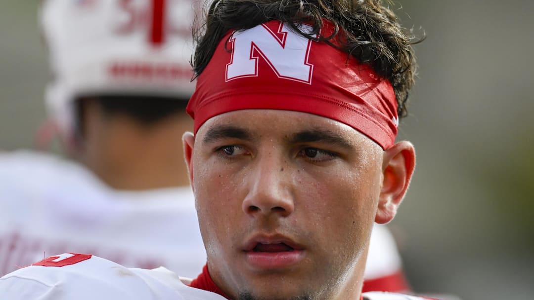Oct 11, 2025; College Park, Maryland, USA;  Nebraska Cornhuskers quarterback Dylan Raiola (15) walks the sidelines during the first half against the Maryland Terrapins at SECU Stadium. 