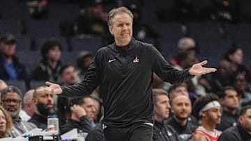 Feb 3, 2025; Charlotte, North Carolina, USA;Washington Wizards head coach Brian Keefe reacts to a call during the second half against the Charlotte Hornets at Spectrum Center. Mandatory Credit: Jim Dedmon-Imagn Images