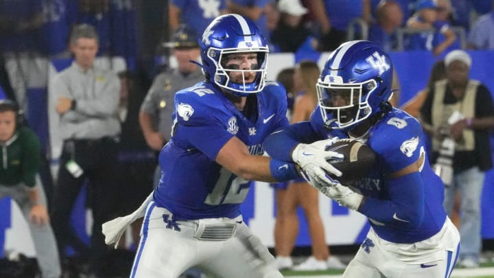 Kentucky’s Brooks Vandagiff hands the ball off to Demie Sumo-Karngbaye against Southern Miss Saturday night at Kroger Field.
Aug. 31, 2024