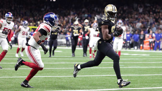 Dec 17, 2023; New Orleans, Louisiana, USA; New Orleans Saints tight end Juwan Johnson (83) scores a touchdown 