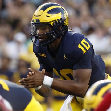 Aug 31, 2024; Ann Arbor, Michigan, USA;  Michigan Wolverines quarterback Alex Orji (10) waits for the snap against the Fresno State Bulldogs in the first half at Michigan Stadium. Mandatory Credit: Rick Osentoski-USA TODAY Sports