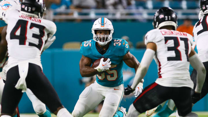 Former Miami Dolphins running back Chris Brooks signed to the Green Bay Packers' practice squad.