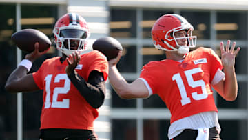 Cleveland Browns quarterback Joe Flacco (15) and quarterback Shedeur Sanders (12) look downfield during NFL training camp at CrossCountry Mortgage Campus, Wednesday, July 30, 2025, in Berea, Ohio.