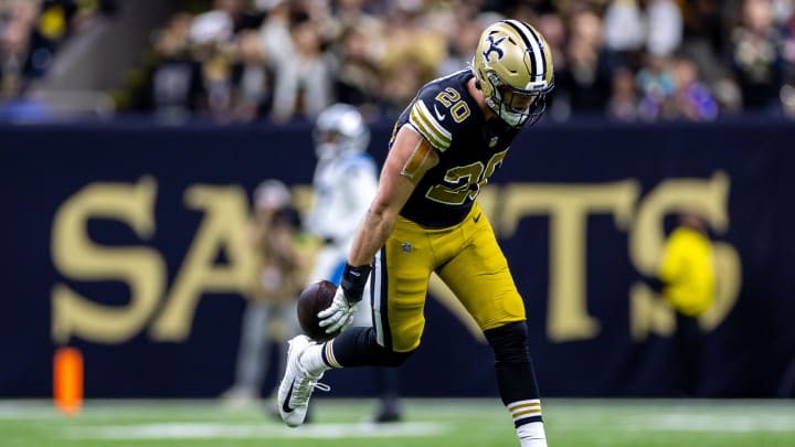 Dec 10, 2023; New Orleans, Louisiana, USA; New Orleans Saints linebacker Pete Werner (20) reacts to recovering a fumble by Carolina Panthers quarterback Bryce Young (9) during the first half at the Caesars Superdome. Mandatory Credit: Stephen Lew-USA TODAY Sports