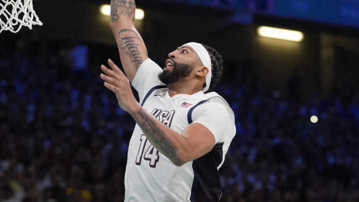 Jul 31, 2024; Villeneuve-d'Ascq, France; United States center Anthony Davis (14) shoots in the fourth quarter against South Sudan during the Paris 2024 Olympic Summer Games at Stade Pierre-Mauroy. Mandatory Credit: John David Mercer-USA TODAY Sports