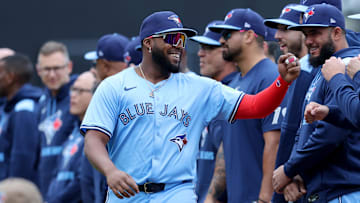 Apr 4, 2025; New York City, New York, USA; Toronto Blue Jays first baseman Vladimir Guerrero Jr. (27) is introduced before the New York Mets home opener at Citi Field. Mandatory Credit: Brad Penner-Imagn Images