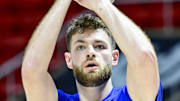 Feb 15, 2025; Salt Lake City, Utah, USA; Kansas Jayhawks center Hunter Dickinson (1) warms up before the game against the Utah Utes at the Jon M. Huntsman Center. Mandatory Credit: Christopher Creveling-Imagn Images