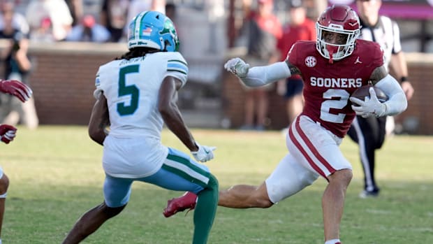 Oklahoma DB Billy Bowman Jr. (2) returns an interception against Tulane on Sept. 14, 2024.