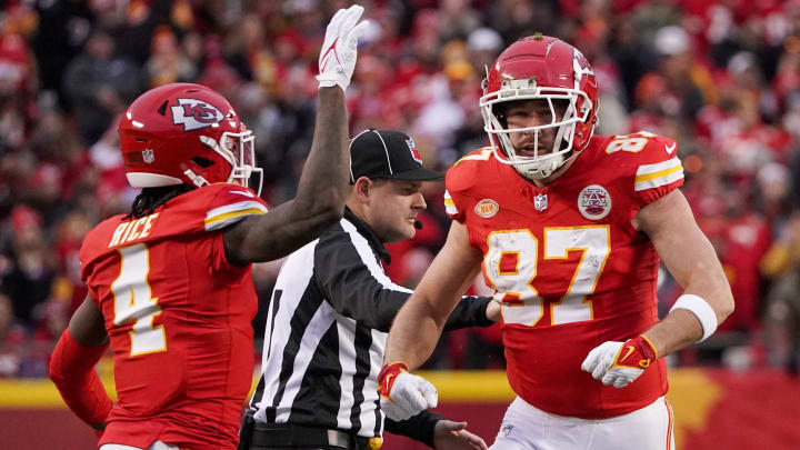Dec 10, 2023; Kansas City, Missouri, USA; Kansas City Chiefs tight end Travis Kelce (87) celebrates with wide receiver Rashee Rice (4) after a run against the Buffalo Bills during the first half at GEHA Field at Arrowhead Stadium. Mandatory Credit: Denny Medley-USA TODAY Sports