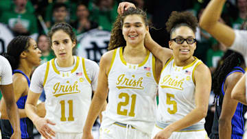 Notre Dame guard Olivia Miles (5) and forward Maddy Westbeld (21) celebrate going into a timeout during a NCAA women's basketball game between No. 1 Notre Dame and No. 11 Duke at Purcell Pavilion on Monday, Feb. 17, 2025, in South Bend.