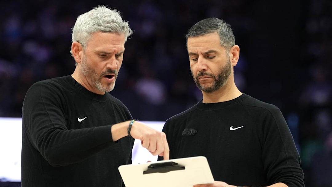 Apr 3, 2026; Sacramento, California, USA; New Orleans Pelicans assistant coach Casey Hill (left) and interim head coach James Borrego (right) talk during the fourth quarter against the Sacramento Kings at Golden 1 Center. Mandatory Credit: Darren Yamashita-Imagn Images