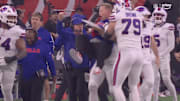 Bills special teams coordinator Chris Tabor got some air after a kickoff return touchdown