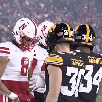 Nebraska players deny Iowa's handshakes before their game.