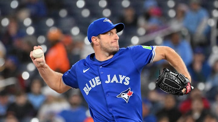 Mar 29, 2025; Toronto, Ontario, CAN; Toronto Blue Jays starting pitcher Max Scherzer (31) delivers a pitch against the Baltimore Orioles in the first inning at Rogers Centre. Mandatory Credit: Dan Hamilton-Imagn Images