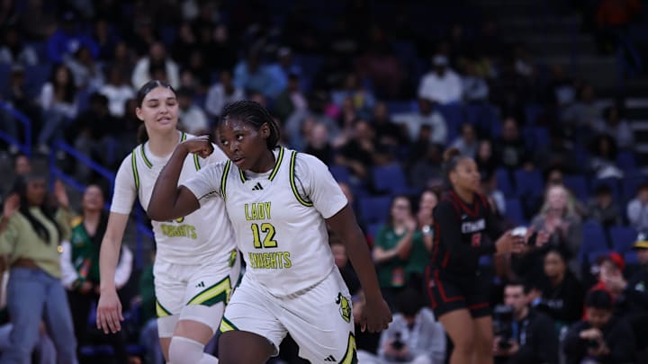 Tati Griffin (12) celebrates after a big shot against Etiwanda in the CIF Southern Section Open Division final at the Toyota Arena in Ontario, Calif. on Saturday, March 1. Tati Griffin (12) celebrates after a big shot against Etiwanda in the CIF Southern Section Open Division final at the Toyota Arena in Ontario, Calif. on Saturday, March 1.